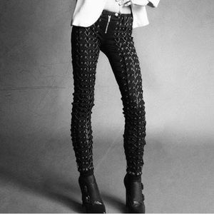 Black skinny leather strung grommet pants